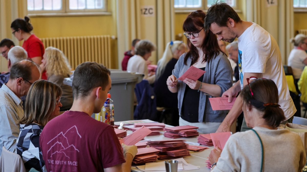 Officials prepare absentee ballots at a Steglitz-Zehlendorf district building during the state elections in Berlin, Germany, Sept. 20, 2026. (Reuters Photo)