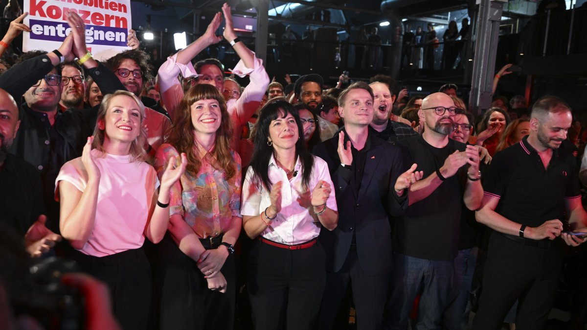 Elif Eralp (C) joins fellow party members and supporters in celebrating the election results, Berlin, Germany, Sept. 20, 2026. (AA Photo)