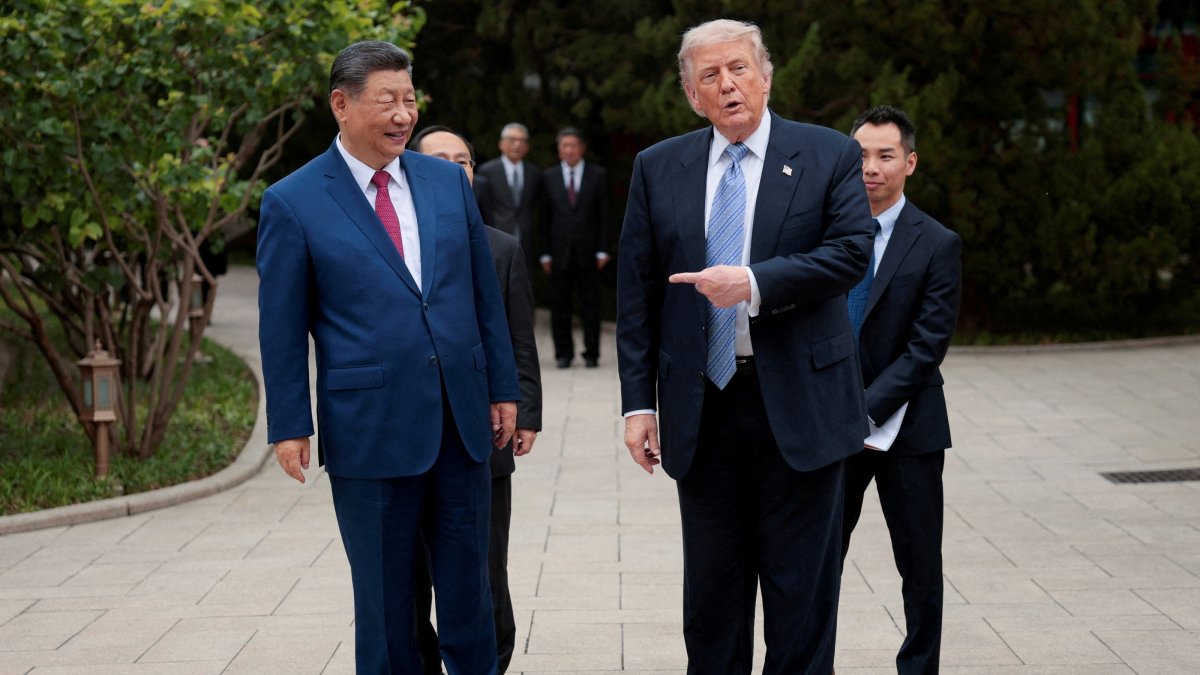U.S. President Donald Trump gestures toward Chinese President Xi Jinping while leaving after a visit to the Zhongnanhai Garden in Beijing, China, May 15, 2026. (Reuters Photo)