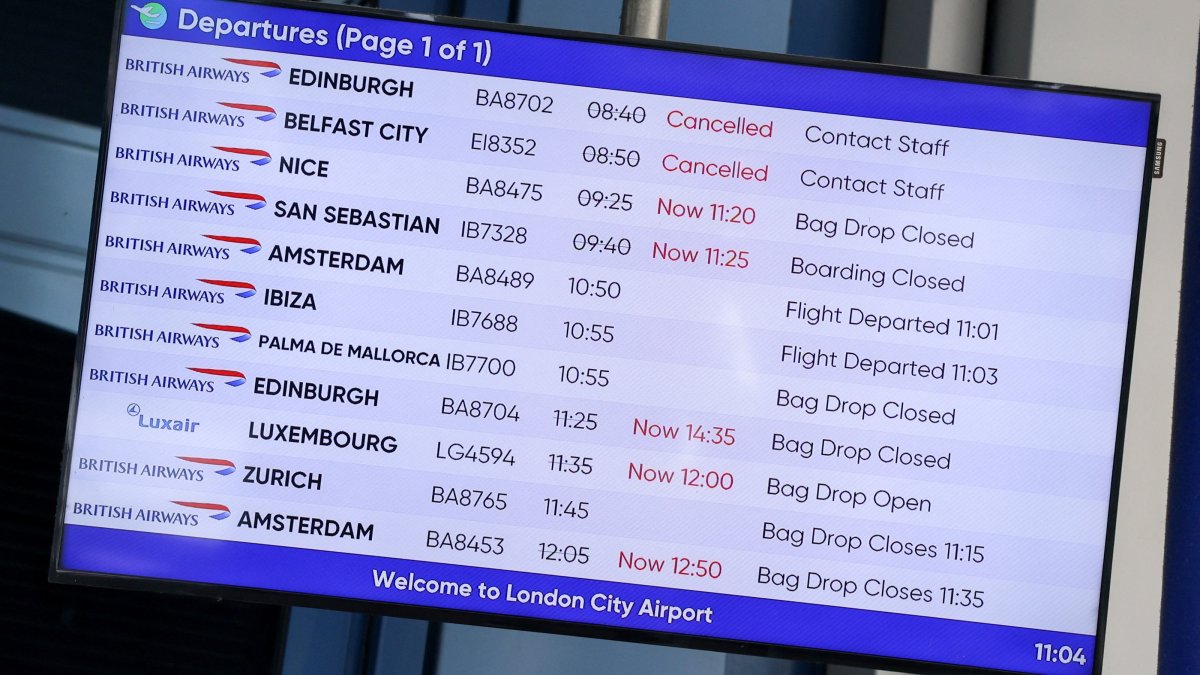 A departure board displays delayed and canceled flights at London City Airport as flights are affected by an air traffic control failure linked to NATS' Prestwick center in Scotland, disrupting flights across northern England, Scotland and Northern Ireland, London, Britain, Sept. 21, 2026. (Reuters Photo)