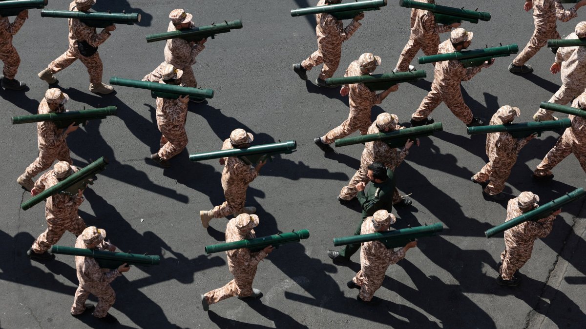 Members of Iranian militia forces (Basij) attend a military march in Tehran, Iran, Sept. 18, 2026. (Reuters Photo)