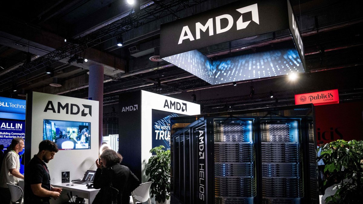 People visit the AMD booth on day one of the Al In 2026 conference at the Palais des Congres de Montreal in Montreal, Quebec, Canada, Sept. 16, 2026. (AFP Photo)
