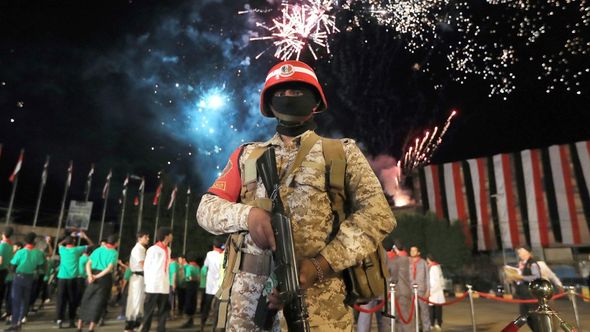 A security personnel stands guard during a ceremony organized by Houthi rebels to mark the 12th anniversary of takeover of Yemeni capital, in Sanaa, Yemen, Sept. 20, 2026. (AFP Photo)