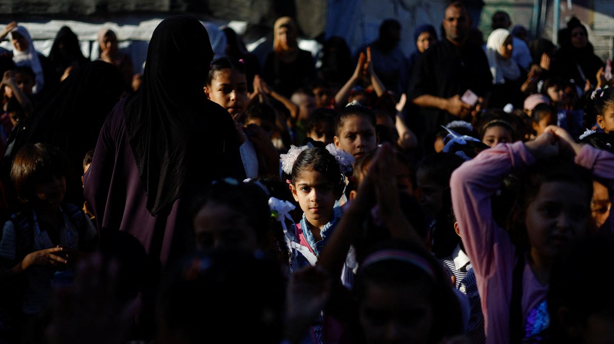 Palestinian students attend their first day of the new school year at an UNRWA school in Nuseirat, in the central Gaza Strip, Sept. 19, 2026. (Reuters Photo)