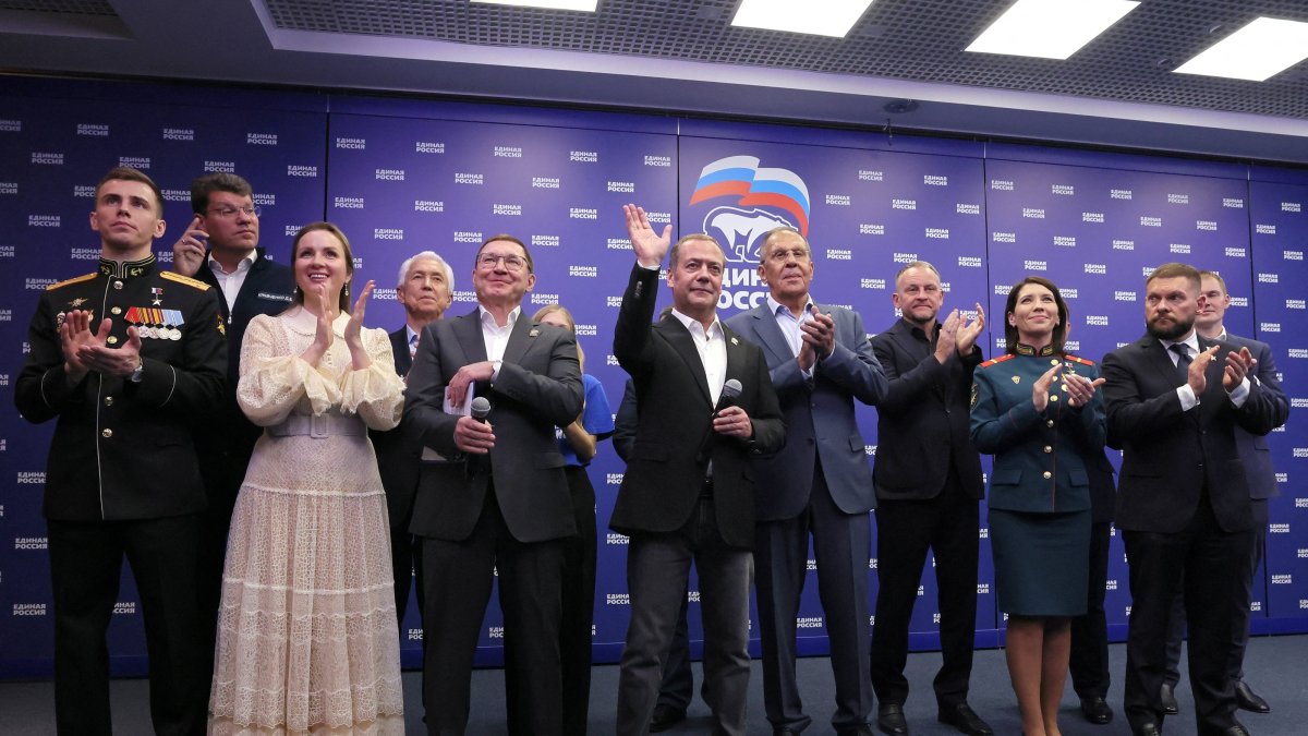 Senior members of Russia's ruling United Russia party, including Deputy Chairman of the Russian Security Council Dmitry Medvedev and Foreign Minister Sergei Lavrov, visit the party's headquarters following the announcement of preliminary results of a parliamentary election in Moscow, Russia, Sept. 20, 2026. (Handout via Reuters)