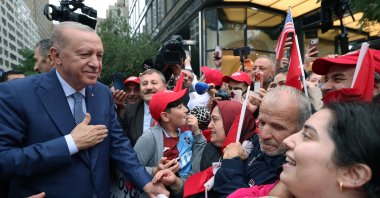 President Recep Tayyip Erdoğan greets a crowd welcoming him outside the Turkish House (Türkevi), New York, U.S., Sept. 21, 2026. (AA Photo)