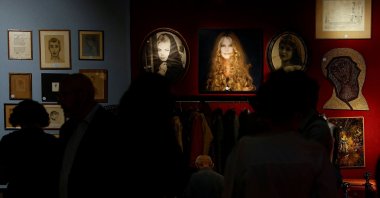 Visitors walk through a preview exhibition of personal belongings once owned by the late French actress Brigitte Bardot, Maison Drouot, Paris, France, Sept. 15, 2026. (AFP Photo)