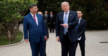U.S. President Donald Trump gestures toward Chinese President Xi Jinping while leaving after a visit to the Zhongnanhai Garden in Beijing, China, May 15, 2026. (Reuters Photo)
