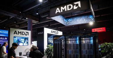 People visit the AMD booth on day one of the Al In 2026 conference at the Palais des Congres de Montreal in Montreal, Quebec, Canada, Sept. 16, 2026. (AFP Photo)
