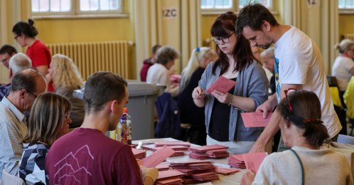 Officials prepare absentee ballots at a Steglitz-Zehlendorf district building during the state elections in Berlin, Germany, Sept. 20, 2026. (Reuters Photo)