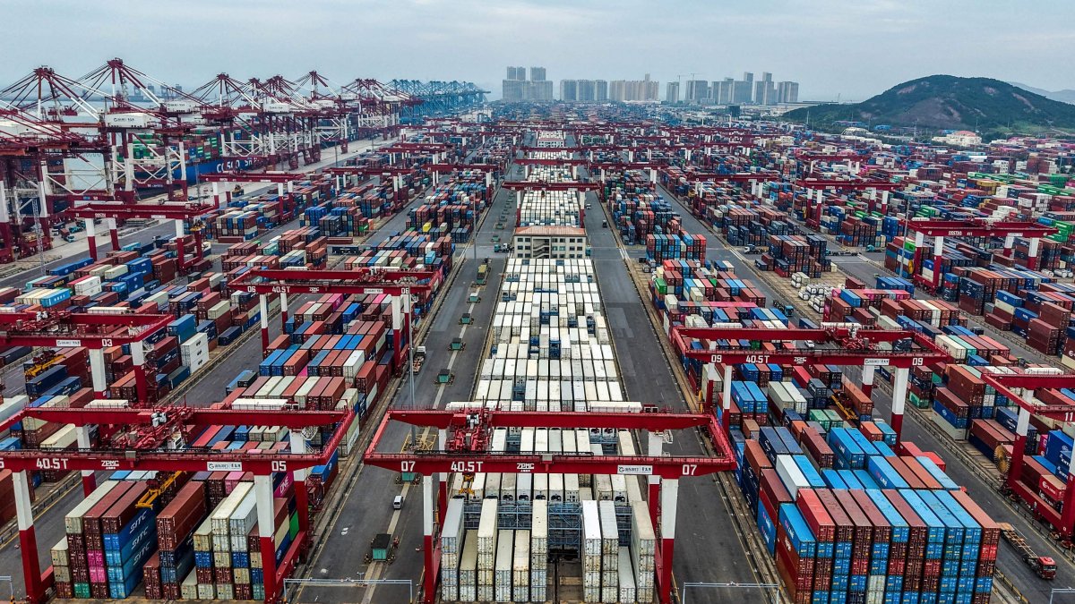 Containers are seen at the port in Qingdao, China, Sept. 21, 2026. (AFP Photo)
