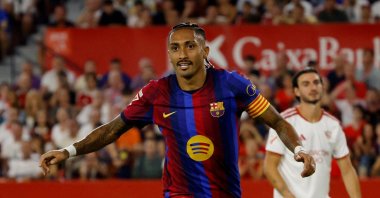 Barcelona's Raphinha celebrates scoring during the La Liga match against Sevilla at Estadio Ramon Sanchez Pizjuan, Seville, Spain, Sept. 19, 2026. (Reuters Photo)