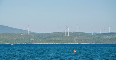 Wind turbines are seen in Sığacık, a seaside neighborhood of Seferihisar, Izmir,Türkiye, Dec. 14, 2020. (Shutterstock Photo)