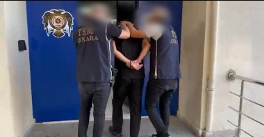 Police officers escort a FETÖ suspect after a counterterrorism operation, Ankara, Türkiye, Sept. 16, 2026. (DHA Photo)