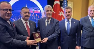 Trade Minister Ömer Bolat (C) is presented with a recognition during business contacts in New York, U.S., Sept. 21, 2026. (AA Photo)