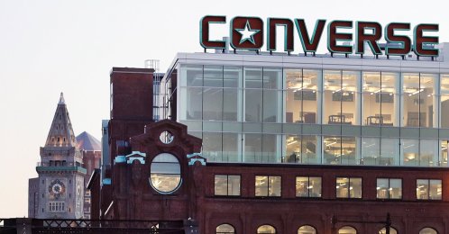 The Converse logo is displayed on the roof of the company's world headquarters, West End neighborhood, Boston, U.S., Dec. 28, 2016. (AP Photo)