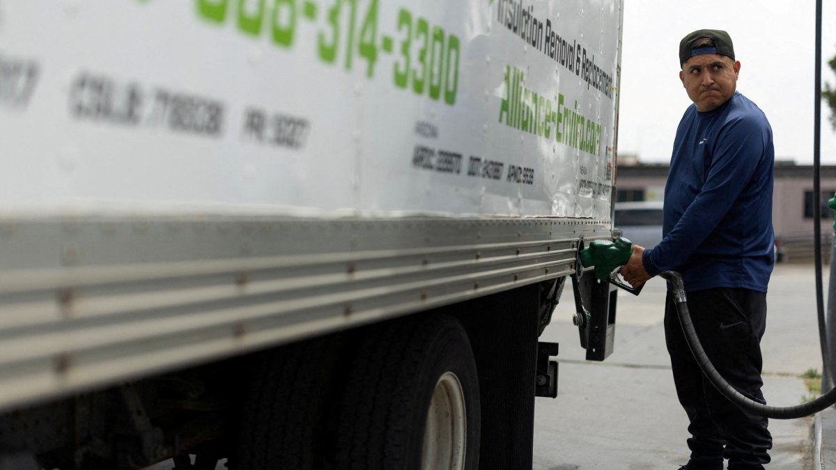 A worker fills his truck with diesel fuel at a corporate filling station, San Diego, California, U.S., May 18, 2026. (Reuters Photo)