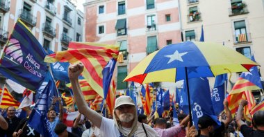 Supporters of the far-right party Alianca Catalana shout slogans at Catalan separatists protesting their presence at Barcelona's Fossar de les Moreres, a key site of Catalan nationalism and a symbolic memorial to those who died in 1714, in Barcelona's El Born neighborhood, Spain, Sept. 10, 2026. (Reuters Photo)