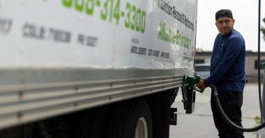 A worker fills his truck with diesel fuel at a corporate filling station, San Diego, California, U.S., May 18, 2026. (Reuters Photo)