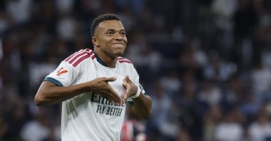 Real Madrid's Kylian Mbappe celebrates scoring the opening goal during the Spanish league football match against Rayo Vallecano de Madrid at Santiago Bernabeu Stadium, Madrid, Spain, Sept. 12, 2026. (AFP Photo)