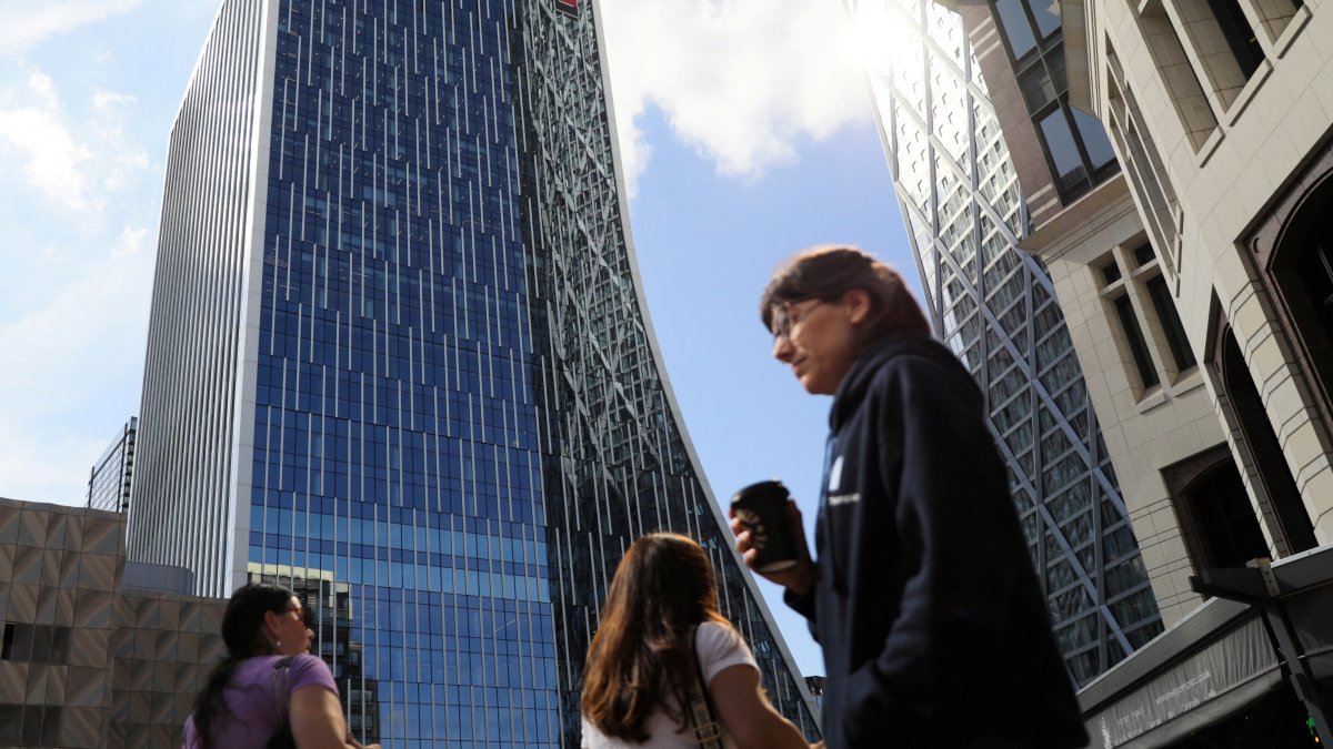 People walk past the new headquarters of the European Bank for Reconstruction and Development (EBRD) in Canary Wharf, London, Britain, Sept. 14, 2023. (Reuters Photo)
