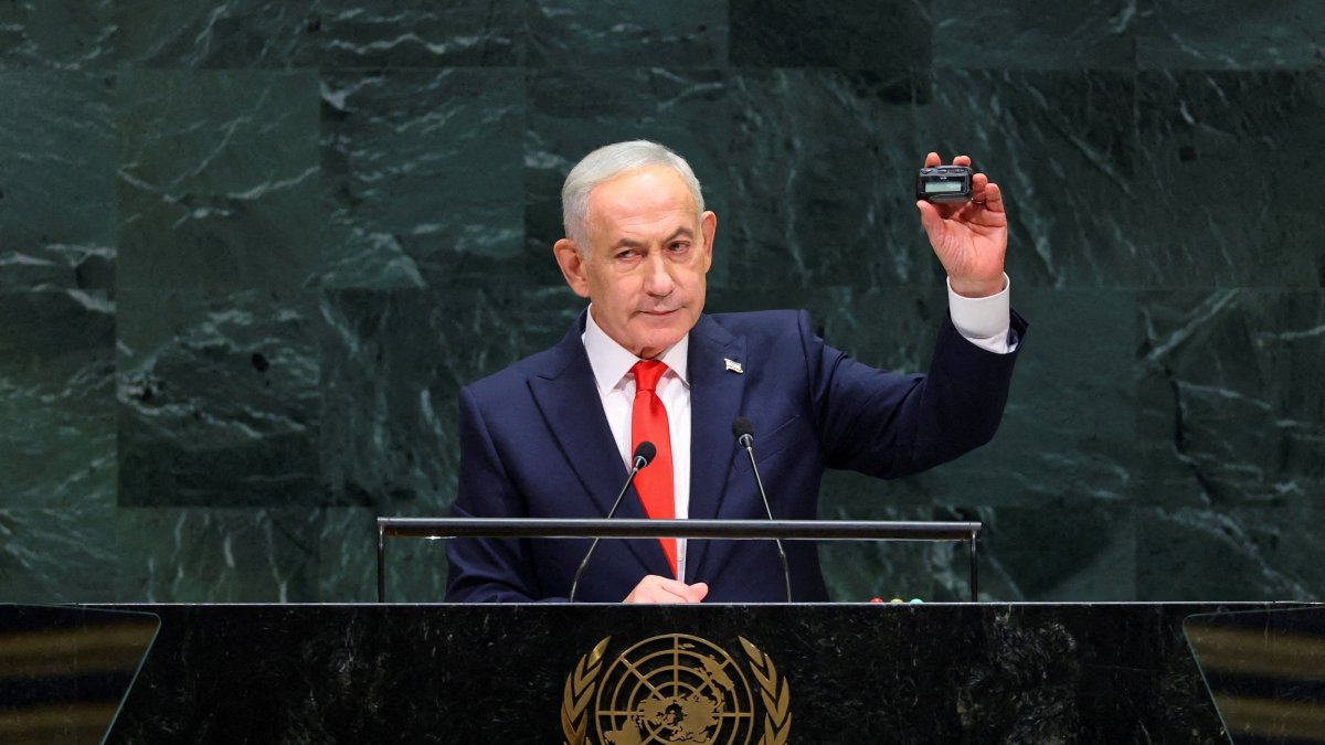 Israeli Prime Minister Benjamin Netanyahu holds up a pager as he addresses the 81st United Nations General Assembly (UNGA) at U.N. headquarters in New York City, Sept. 24, 2026. (Reuters Photo)