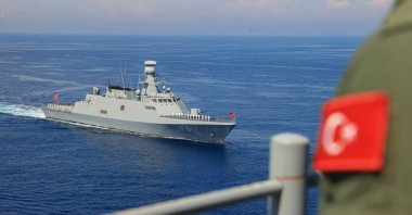 A Turkish soldier looks at a Turkish warship, Eastern Mediterranean, June, 11, 2026. (AA Photo)
