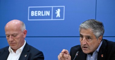 Berlin's outgoing governing mayor Kai Wegner (L) and sports official and Berlin's Olympic Commissioner Kaweh Niroomand give a press conference on the German capital's bid to host the Olympic Games, Berlin, Germany, Sept. 24, 2026. (AFP Photo)
