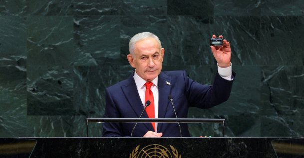 Israeli Prime Minister Benjamin Netanyahu holds up a pager as he addresses the 81st United Nations General Assembly (UNGA) at U.N. headquarters in New York City, Sept. 24, 2026. (Reuters Photo)