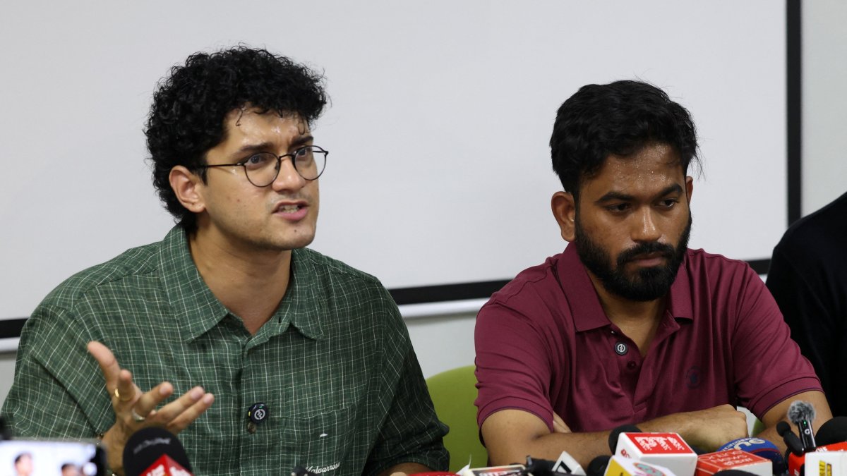 Saurav Das, a convenor of the Cockroach Janta Party (CJP), speaks as the party's head, Abhijeet Dipke looks on during a press conference to demand the resignation of India's Chief Election Commissioner, Gyanesh Kumar, New Delhi, India, Sept. 24, 2026. (Reuters Photo)