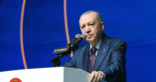 President Recep Tayyip Erdoğan speaks at a ceremony for the placement of relatives of fallen soldiers and veterans, Istanbul, Türkiye, Sept. 19, 2026. (IHA Photo)