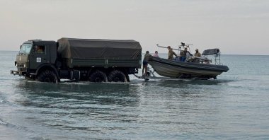 A rescue team operates in the area where a tragic military exercise incident occurred in the Caspian Sea off Kazakhstan, Sept. 25, 2026. (AA Photo)