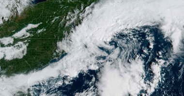 This handout satellite image shows a storm system over the Atlantic Ocean along the East Coast of the United States and Canada, Sept. 25, 2026. (National Oceanic and Atmospheric Administration (NOAA) and their Geostationary Operational Environmental Satellites (GOES) Handout via AFP)