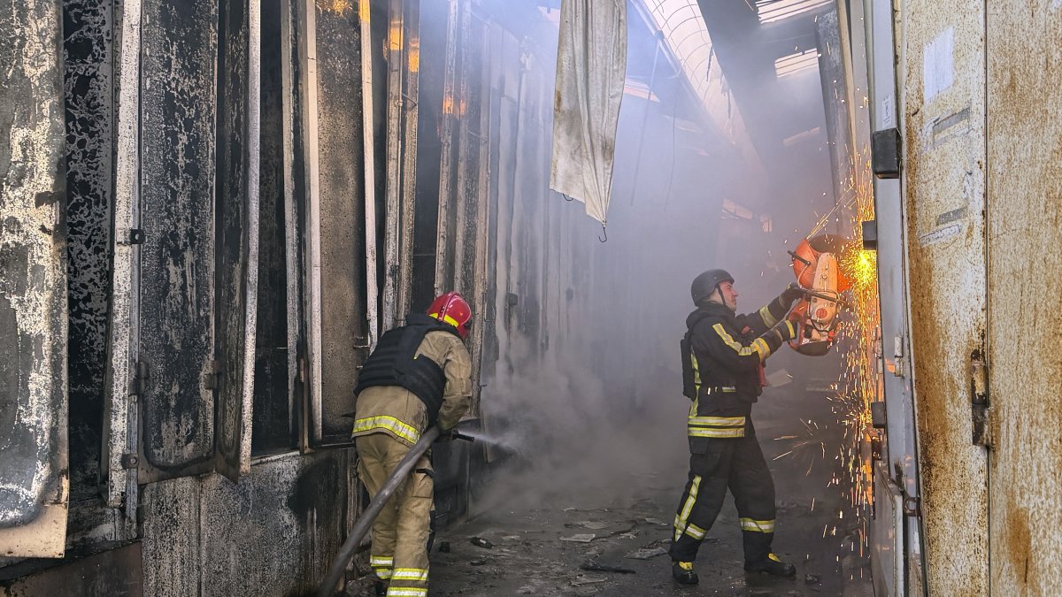 Ukrainian rescuers work at the scene of a Russian attack on a market in a residential area amid the ongoing Russian invasion, Zaporizhzhia, Ukraine, Sept. 26, 2026. (EPA Photo)