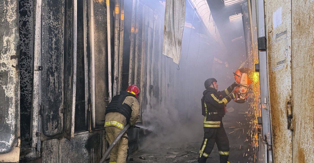 Ukrainian rescuers work at the scene of a Russian attack on a market in a residential area amid the ongoing Russian invasion, Zaporizhzhia, Ukraine, Sept. 26, 2026. (EPA Photo)