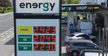 A fuel pump displays the price of diesel at 2.423 euros at a petrol station, Gembloux, Belgium, Sept. 21, 2026. (EPA Photo)
