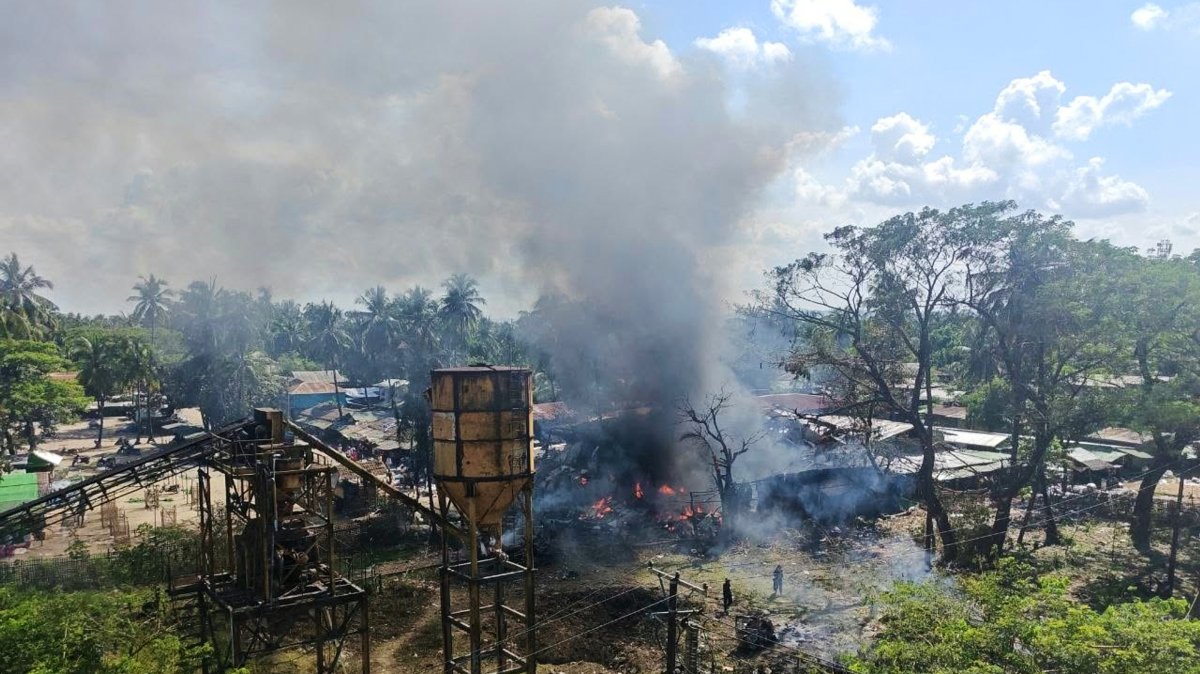 In this photo provided by Wai Hun Aung, smoke rises from a market after the area was allegedly hit by the military's airstrike in Kyauktaw township in Rakhine state, Myanmar, Monday, Sept. 28, 2026. (Wai Hun Aung via AP)