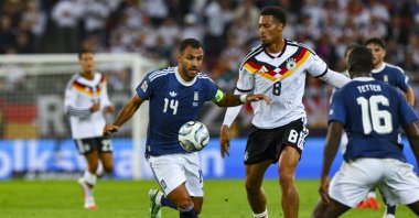Greece's Vangelis Pavlidis (L) and Felix Nmecha of Germany in action during the UEFA Nations League match in Augsburg, Germany, Sept. 27, 2026. (EPA Photo)