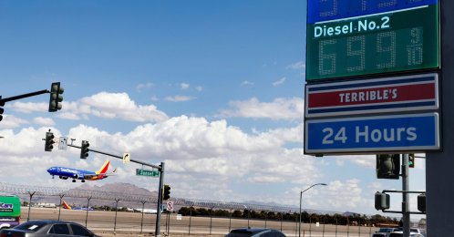 A Terrible's gas station on Sunset Road displays its gas prices as a Southwest Airlines plane prepares to land at Harry Reid International Airport in Las Vegas, U.S., Sept. 18, 2026. (AP Photo)
