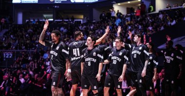 Beşiktaş players line up during the pregame ceremony before the 39th Men's Presidential Cup basketball game against Fenerbahçe Tarfin at Sinan Erdem Sports Hall, Istanbul, Türkiye, Sept. 22, 2026. (AA Photo)