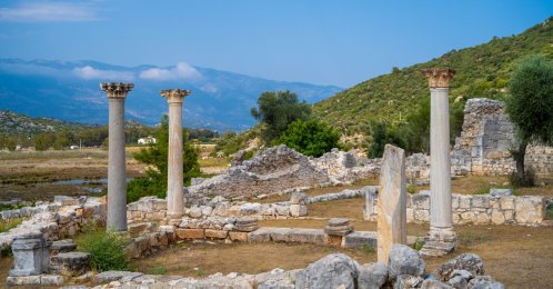 Ancient columns in ancient city of Andriake, Antalya, Türkiye, July 10, 2023. (Shutterstock Photo)