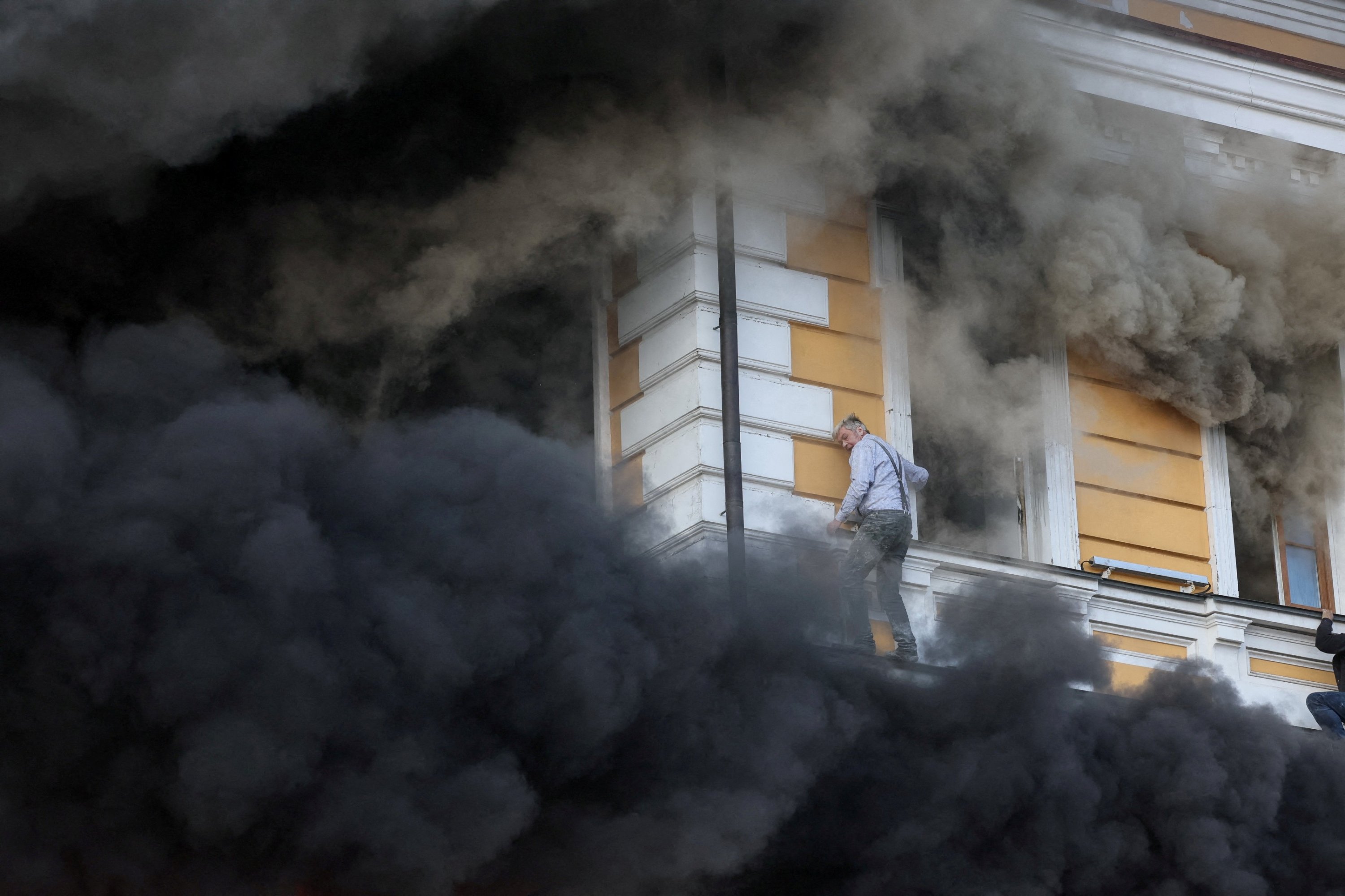Kyiv shrouded in smoke after Russia strikes power plants, kills 4