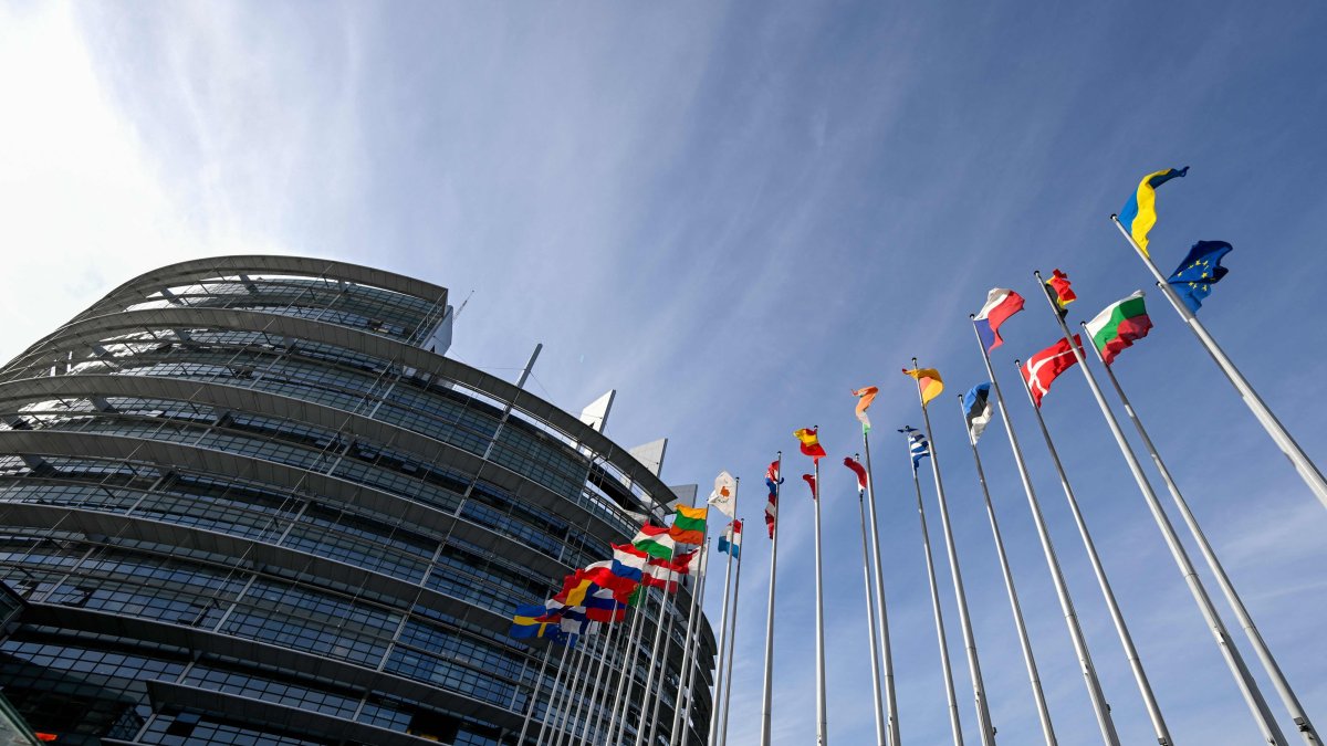 This photo shows the European Union flag surrounded by the national flags of EU member states flapping in the breeze in front of the Louise Weiss building, headquarters of the European Parliament, Strasbourg, France, Sept. 17, 2026. (AFP Photo)