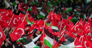 Konyaspor and the Palestine national team face off in a friendly as part of Palestine Day events, with fans waving Turkish and Palestinian flags and singing Palestinian anthems and songs at Konya Metropolitan Municipality Stadium, Konya, Türkiye, Sept. 30, 2026. (AA Photo)