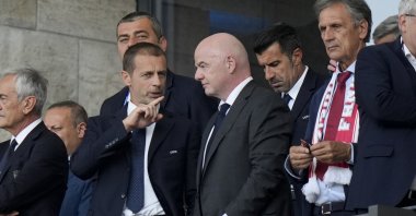 UEFA President Aleksander Ceferin (L) talks to FIFA President Gianni Infantino before a round-of-sixteen match between Switzerland and Italy at the Euro 2024 tournament, Berlin, Germany, June 29, 2024. (AP Photo)