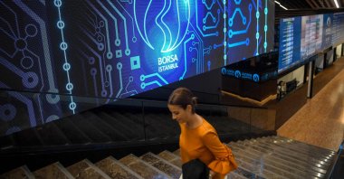 A trader walks inside the Borsa Istanbul Stock Exchange, Istanbul, Türkiye, May 22, 2018. (AFP Photo)