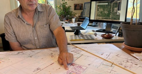 Archaeologist Pierre Blanc, head of excavations for the Roman site and museum of Avenches, points to new Roman buildings added to the map, Vaud, Switzerland, Sept. 28, 2026. (Reuters Photo)