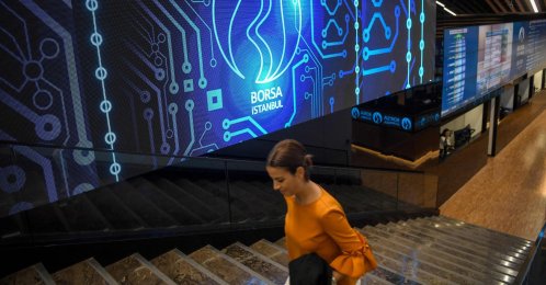 A trader walks inside the Borsa Istanbul Stock Exchange, Istanbul, Türkiye, May 22, 2018. (AFP Photo)