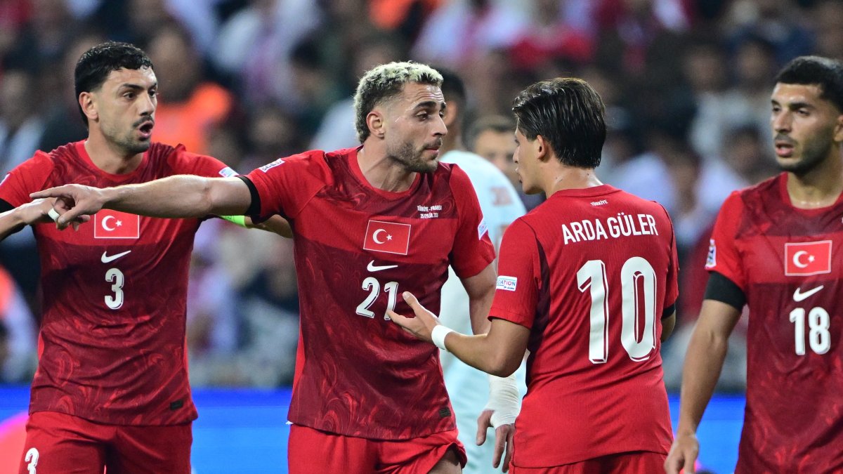 Türkiye's Barış Alper Yılmaz (2nd L) and Arda Güler (2nd R) discuss a play during the UEFA Nations League Group 1 League A match against France at Kocaeli Stadium, Kocaeli, Türkiye, Sept. 25, 2026. (AA Photo)