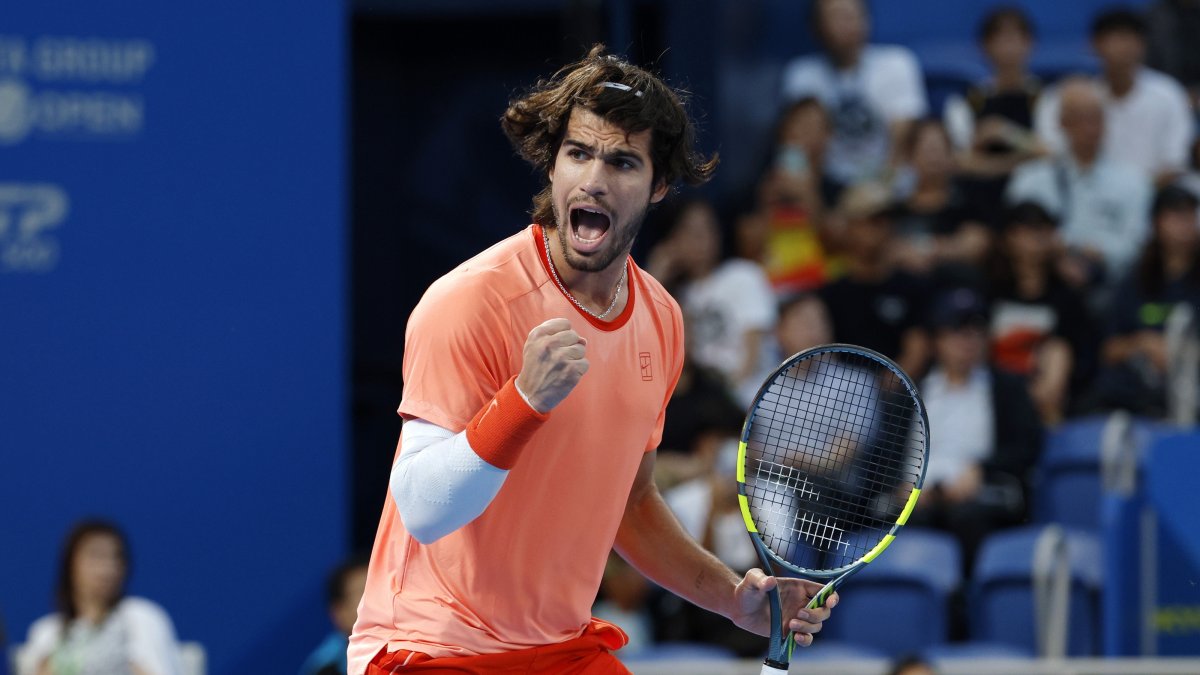 Carlos Alcaraz reacts after scoring a point against Alex Michelsen of the US during his round-of-32 match of the Japan Open tennis tournament at Ariake Colosseum, Tokyo, Japan, Oct. 1, 2026. (EPA Photo)